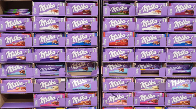 Milka-Verpackungen in Aufsteller Milka-Verpackungen in Aufsteller