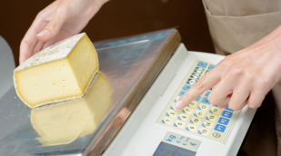 Käse auf der Waage